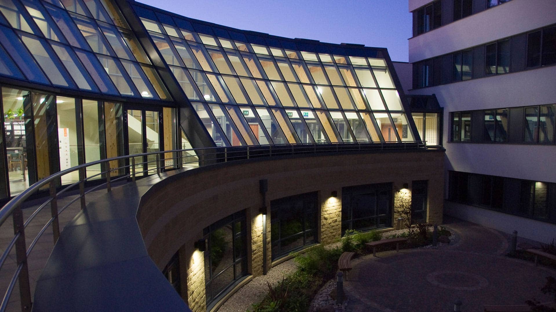 A photo of the business school at night for use on the reasearch section of the website.