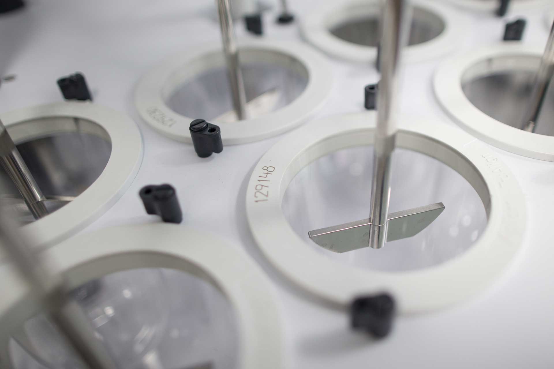 lab instrument with multiple chambers and stirring devices