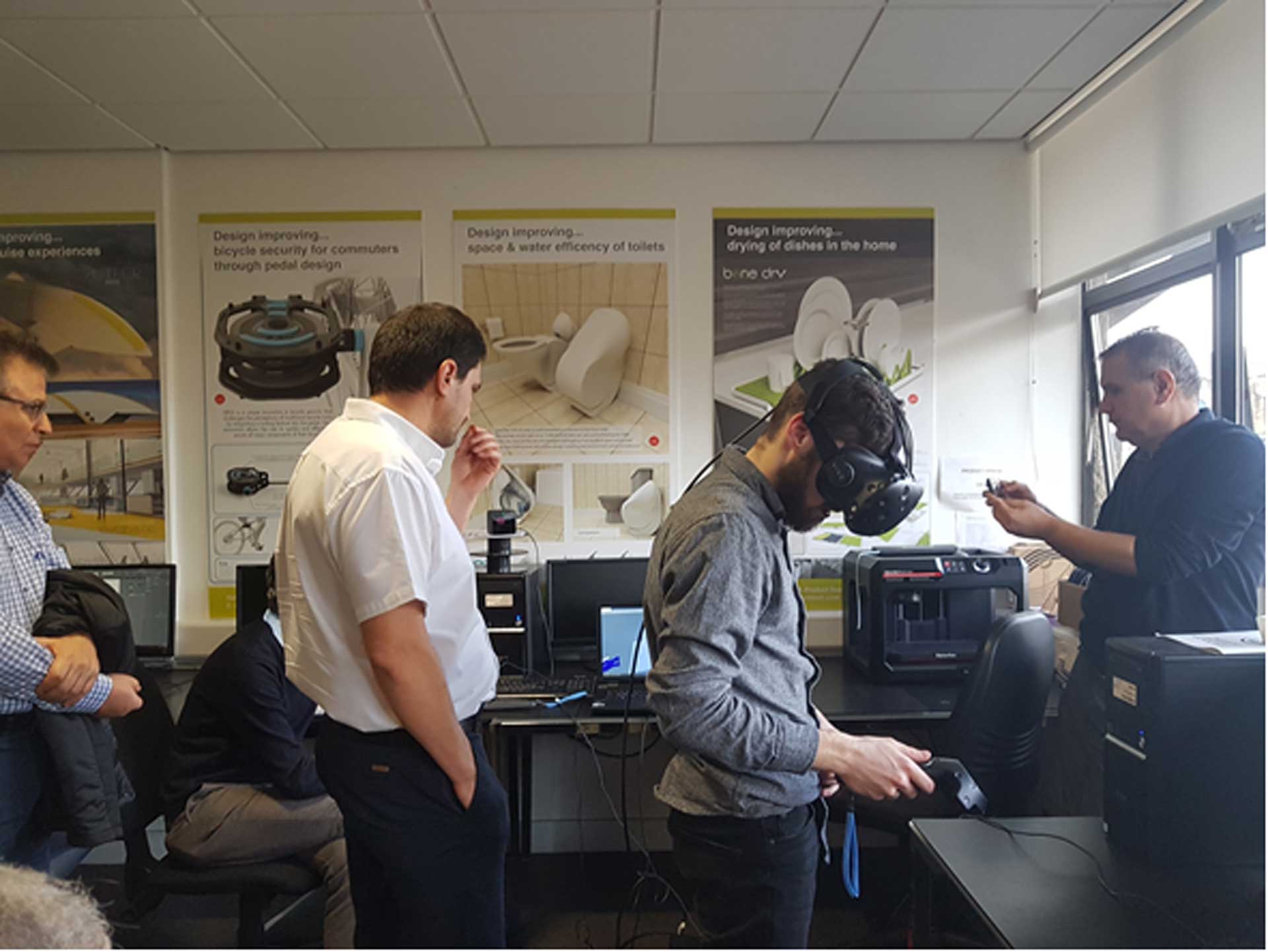 Staff and students using virtual reality headsets